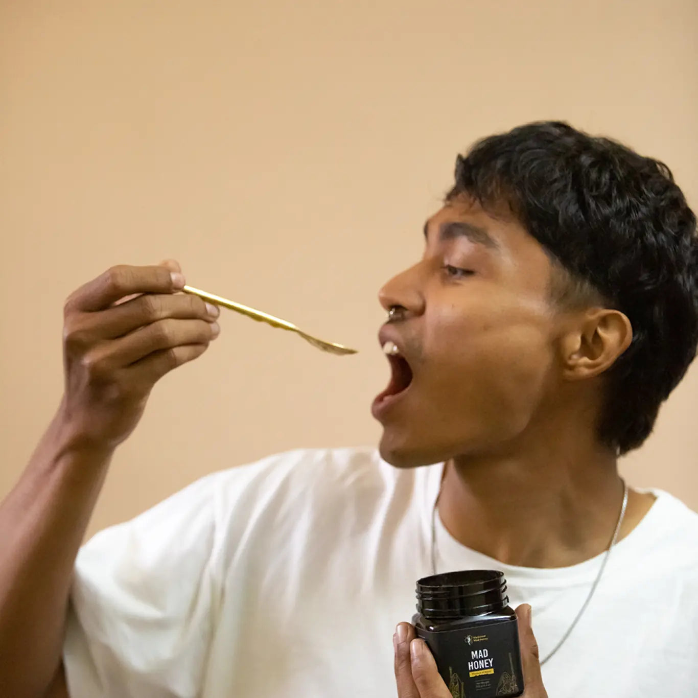 Man eating mad honey