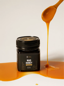 Grayanotoxin honey or himalayan mad honey jar from Nepal with raw wild cliff honey