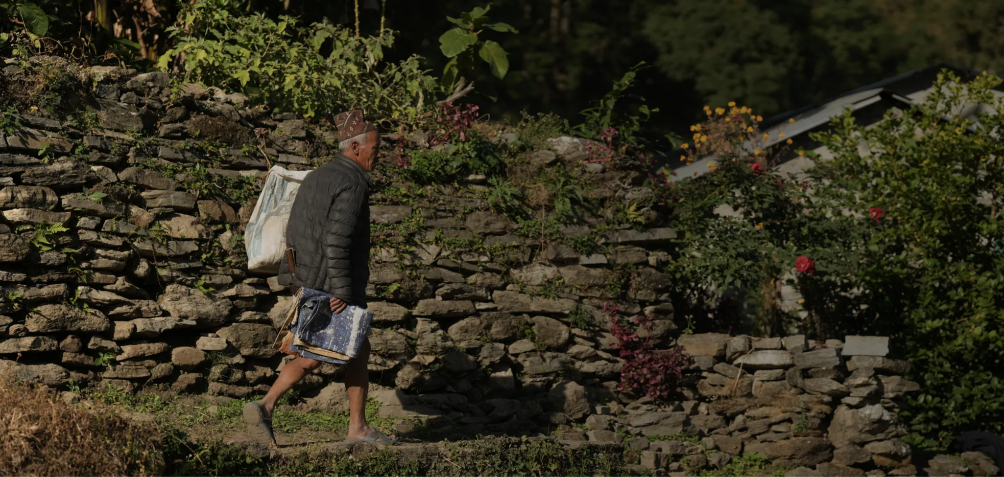 Person walking in village